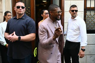 Usher leaves a Venetian restaurant